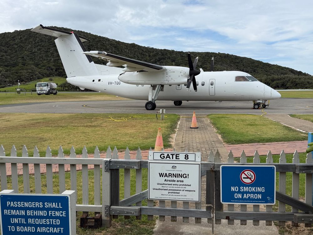 A photo of Dash 8 VH-TQG at Lord Howe island airport.