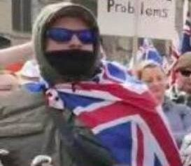 Neil Erikson attending the March For White Australia in a very clever disguise.