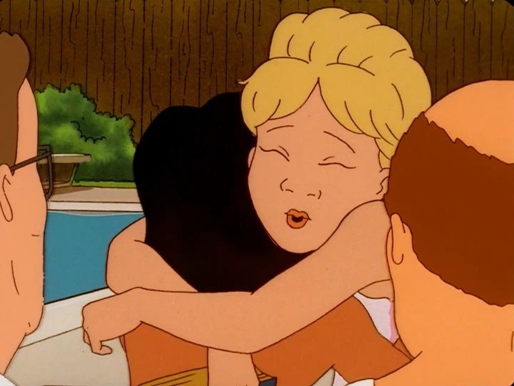 Luanne giving Joseph a fellowship hug for saying his bible verses good