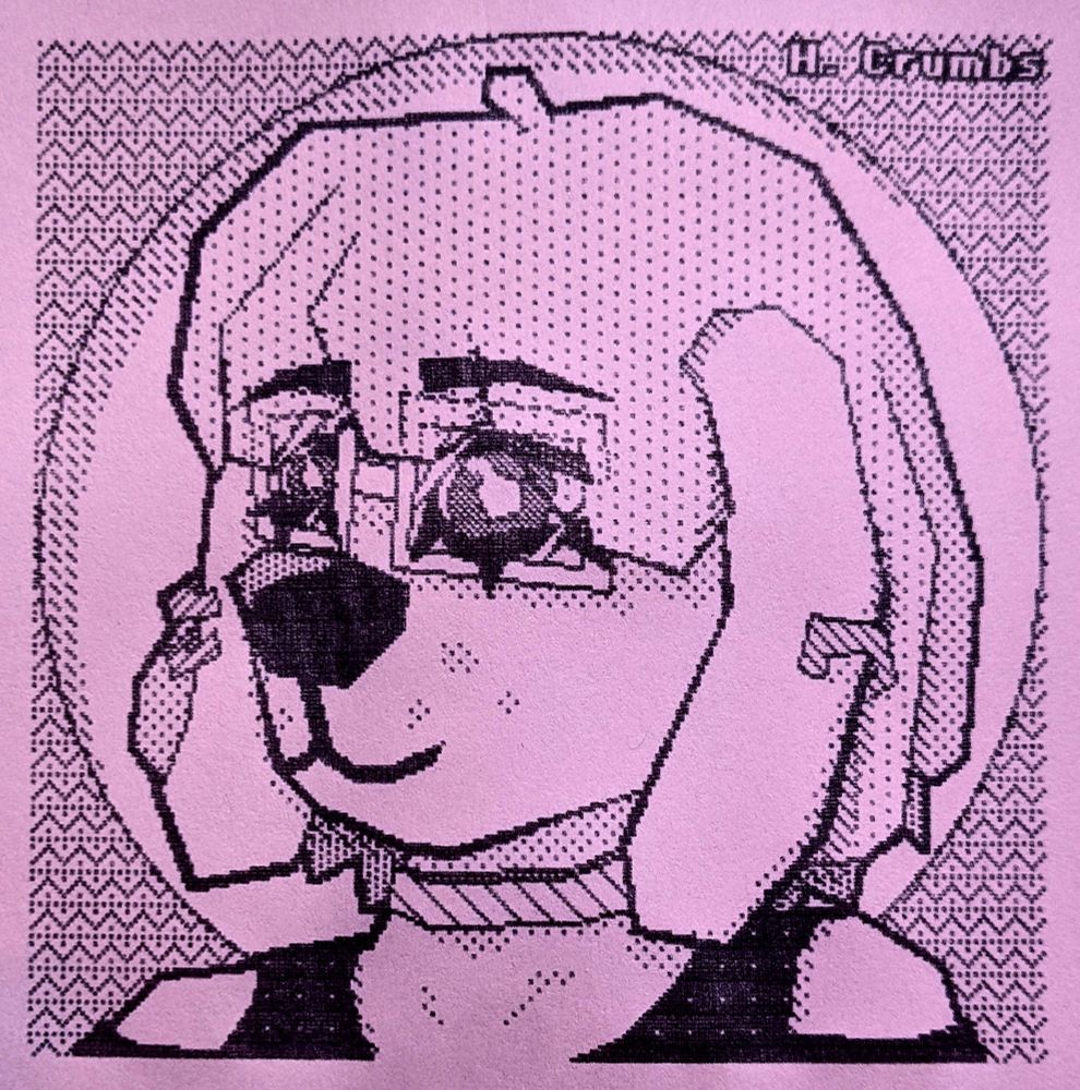 A printout on pink paper of a drawing (made on an old Macintosh computer by @hadleycrumbs.bsky.social) of Caydie, my sona, an anthropomorphic golden retriever with glasses, pretty eyelashes, long hair, a collar, ear piercings, and a dark open-shoulder shirt over a circular background.