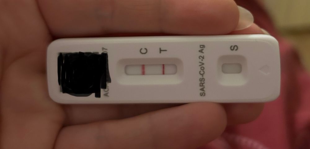 A positive covid lateral flow test.
