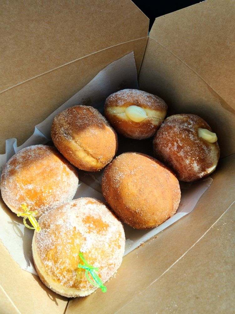 The malasadas I got: lemon sugar covered, cinnamon sugar covered, and vanilla bean filled