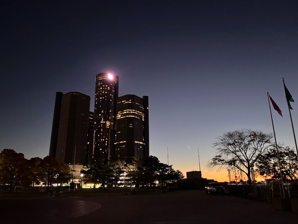 Buildings with sunrise in background 