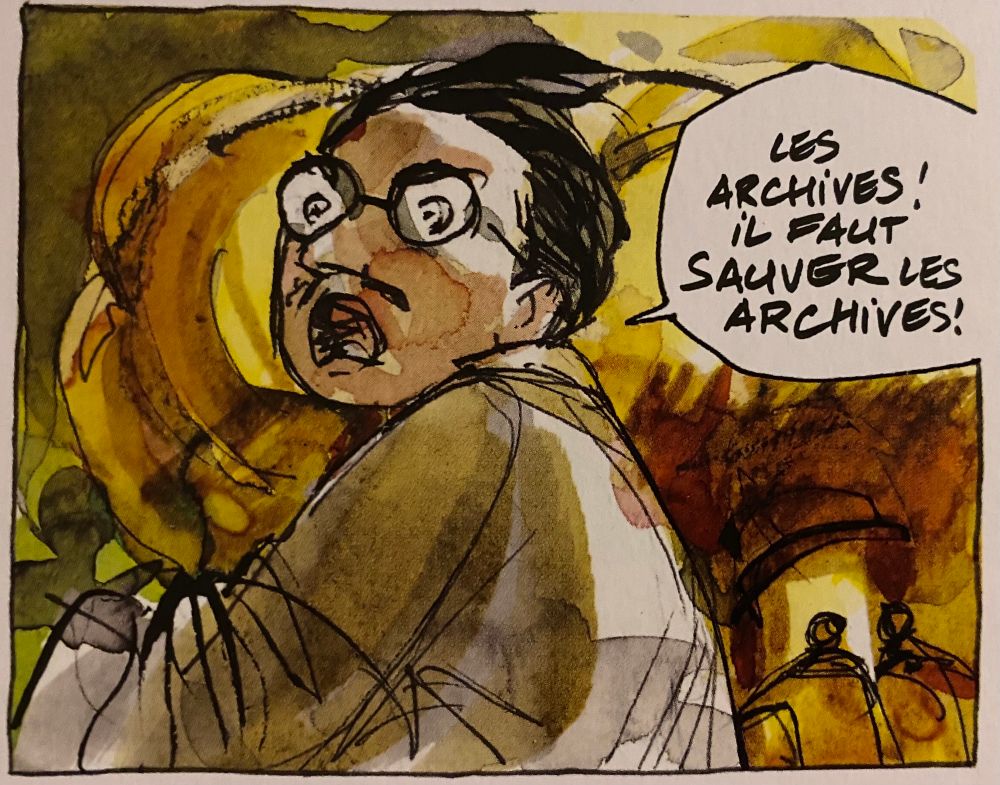 Vignette de bande dessinée : au milieu d’un incendie, un personnage aux petites lunettes rondes crie : « Les archives ! Il faut sauver les archives ! »