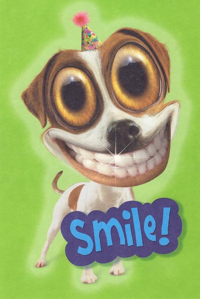 Terrifying dog with human teeth and enlarged eyes saying “Smile!” on a birthday card.