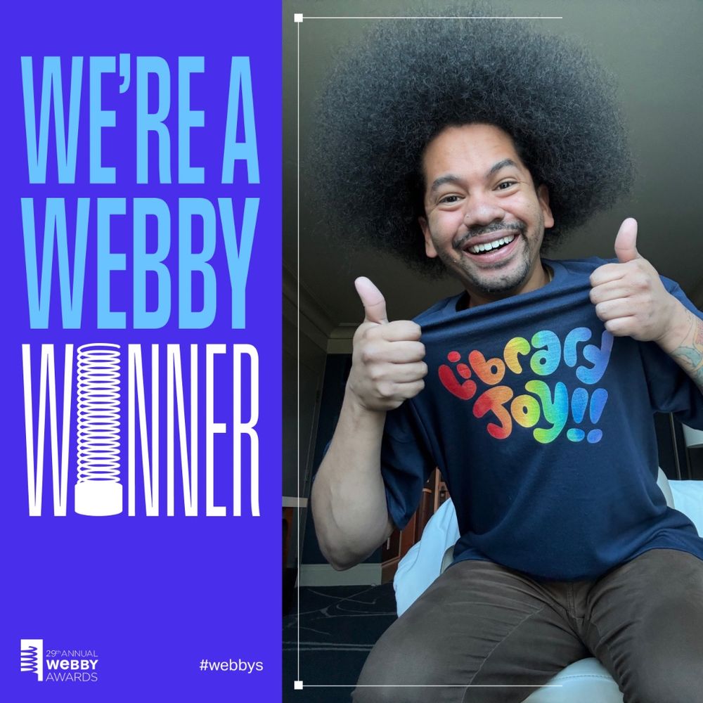 Text reads: WE’RE A WEBBY WINNER. Mychal smiles and gives two thumbs-up while wearing a Library Joy shirt from Out of Print clothing 