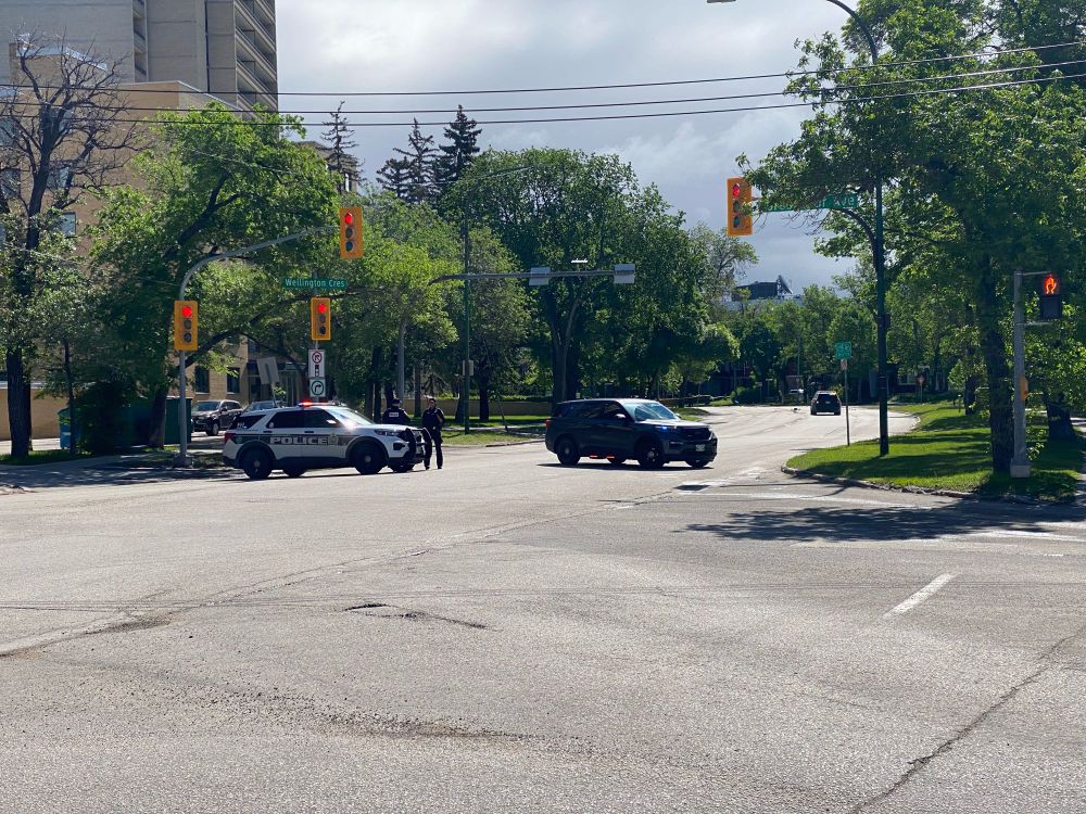 Police vehicles block Wellington Cres at Grosvenor