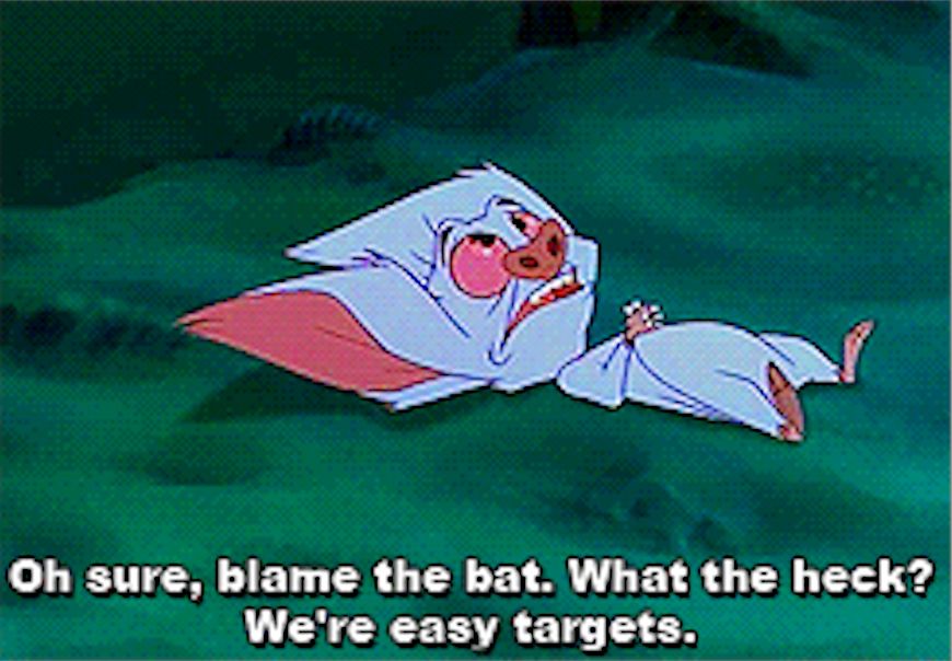 Bartok the bat from the animated movie Anastasia lying on his back with the caption, "Oh sure, blame the bat. What the heck? We're easy targets."