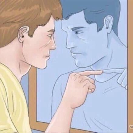 White male figure looks determinedly at self image in mirror, and places pointer finger on glass in a moment of introspection.