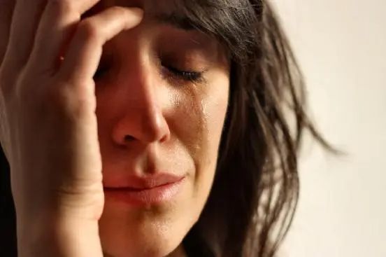 white woman with tears streaming down her face (og first world problems meme)