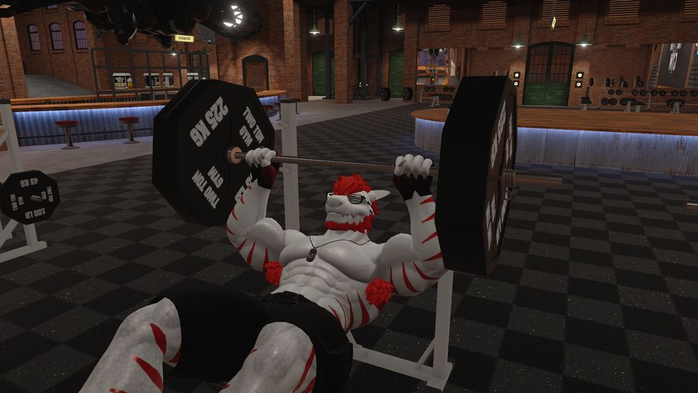 Colin is working out at the gym. Two Ton Gym world.