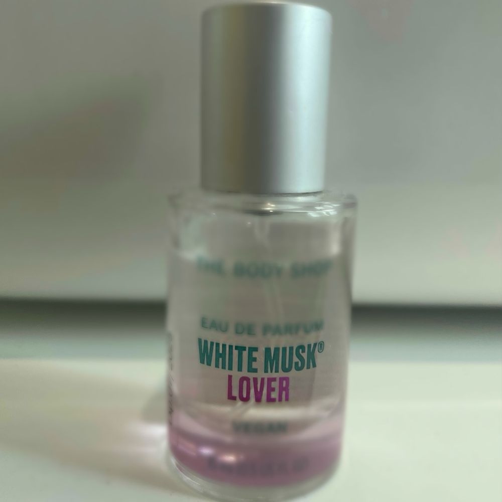A bottle of perfume called White Musk Lover.