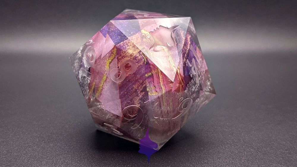 A large d20 with stripes of various shades of purple and gold, with a translucent shell that has silver spilled into it.