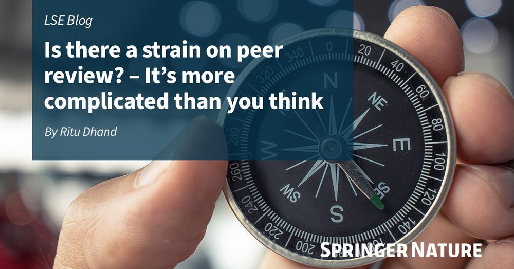 A close-up of a compass held in a person's hand. Overlaid text reads, 'LSE Blog: Is there a strain on peer review? – It's more complicated than you think. By Ritu Dhand' and 'SPRINGER NATURE'.
