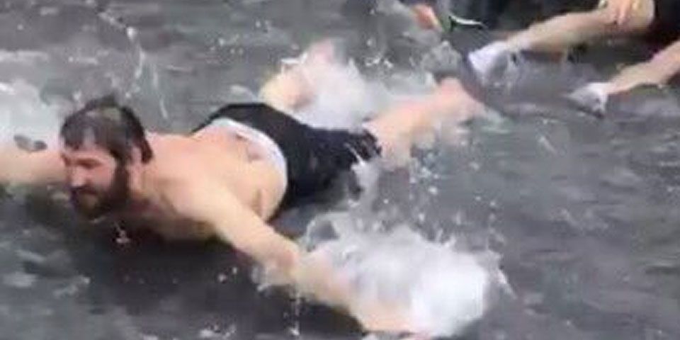 Ovi playing in water