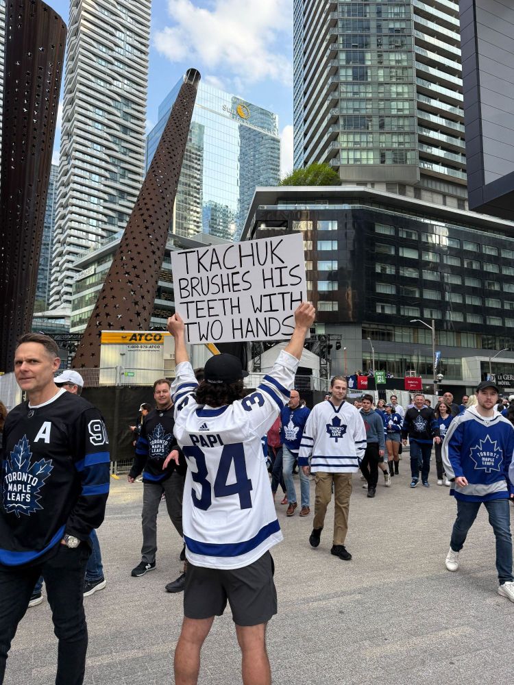 Tkachuk brushes his teeth with two hands