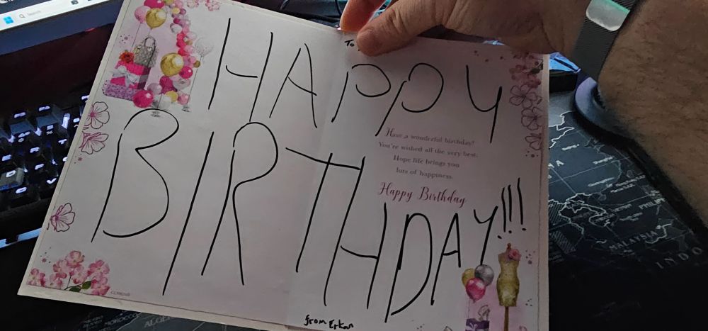 Inside of a birthday card with HAPPY BIRTHDAY written as large as possible taking up all the space of the card. 