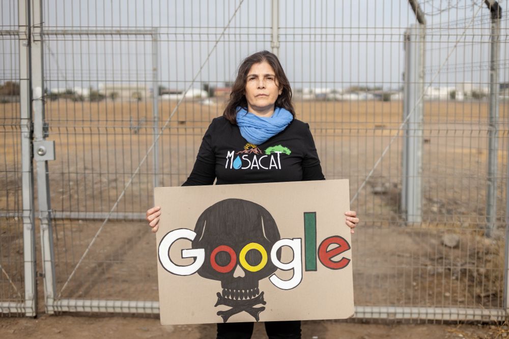 Tania Rodríguez, one of the spokespersons for the Mosacat collective, poses in front of the lot owned by Google in the municipality of Cerrillos, Santiago, Chile. Image by Sofia Yanjari. Chile, 2025.
