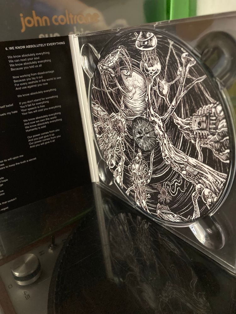 Inside of CD packaging of AutoReplicant – Drone Down album.