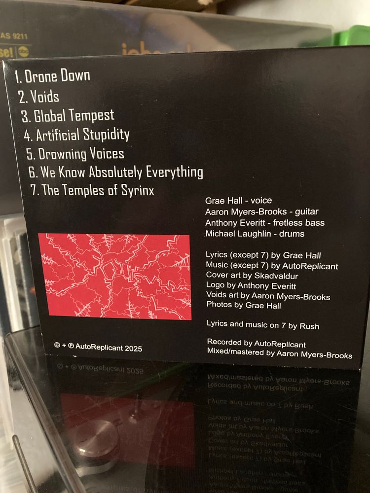 Back of CD packaging of AutoReplicant – Drone Down album.