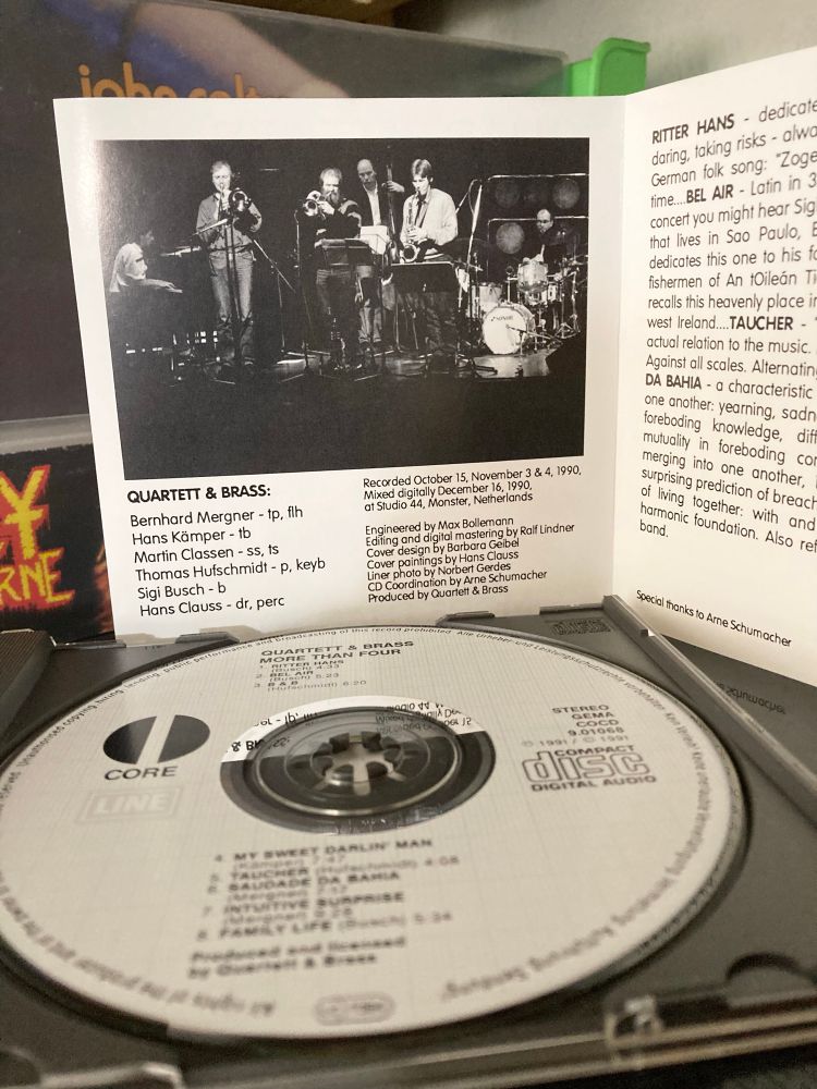 CD in tray and inside of booklet of Quartett & Brass – More Than Four CD album.