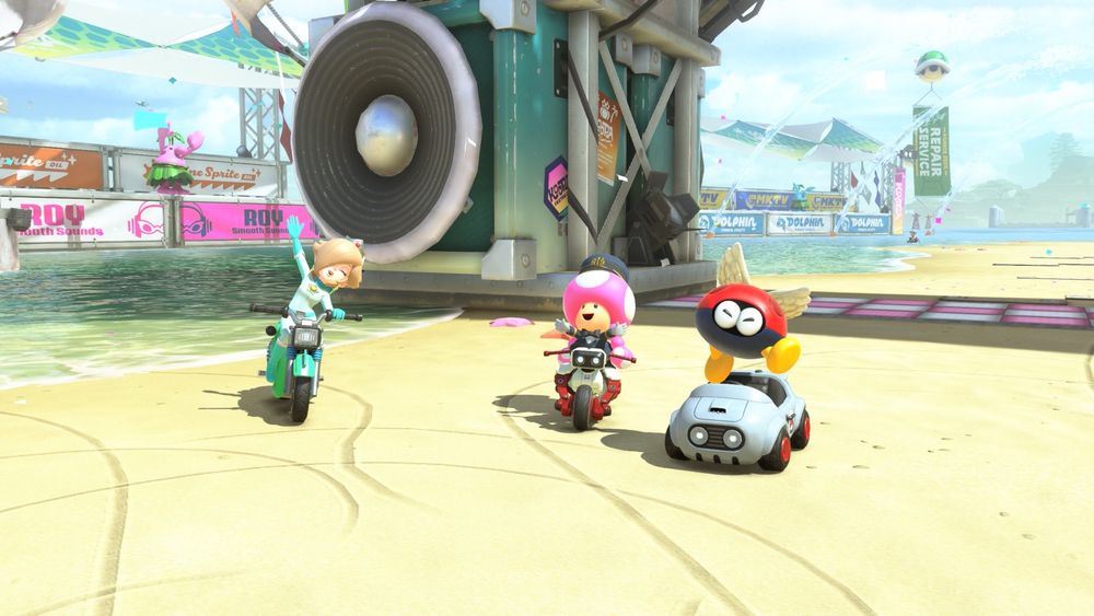 Rosalina, Toadette, and a Para-biddybud posing in Koopa Beach.