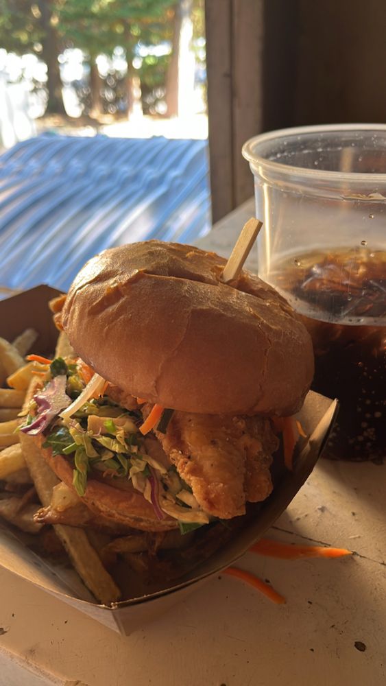 Picture of a Thai fried chicken sandwich with fries 