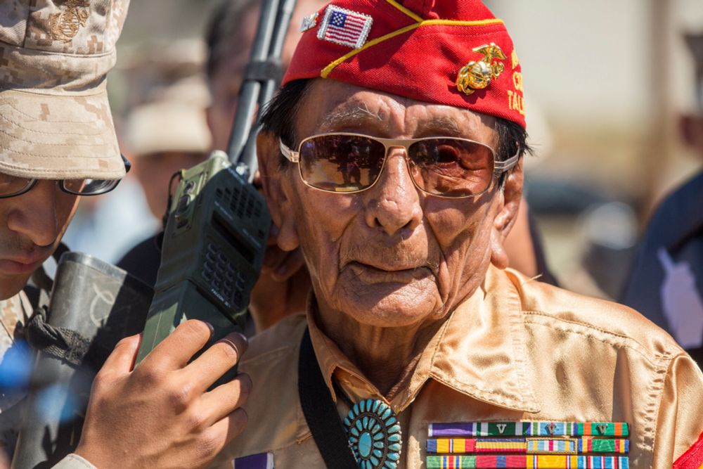 Navajo Code Talker Samuel T. Holiday, a native of Kayenta, Ariz., listens to an incoming radio transmission during a visit to Marine Corps Base Camp Pendleton, Calif., Sept. 28, 2015. U.S. Marine Corps photo by Lance Cpl. Adrianna R. Lincoln.
