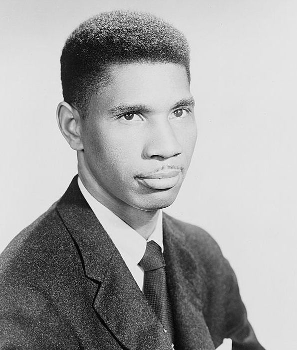Black and white photo of Medgar W. Evers, head-and-shoulders portrait, facing right. Visual materials from the NAACP records, Library of Congress Prints and Photographs Division. Used with permission from the NAACP.