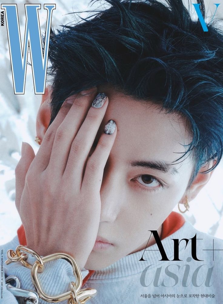 Taehyung on the cover of W Asia magazine, covering half his face with one hand. Pretty nail polish!!