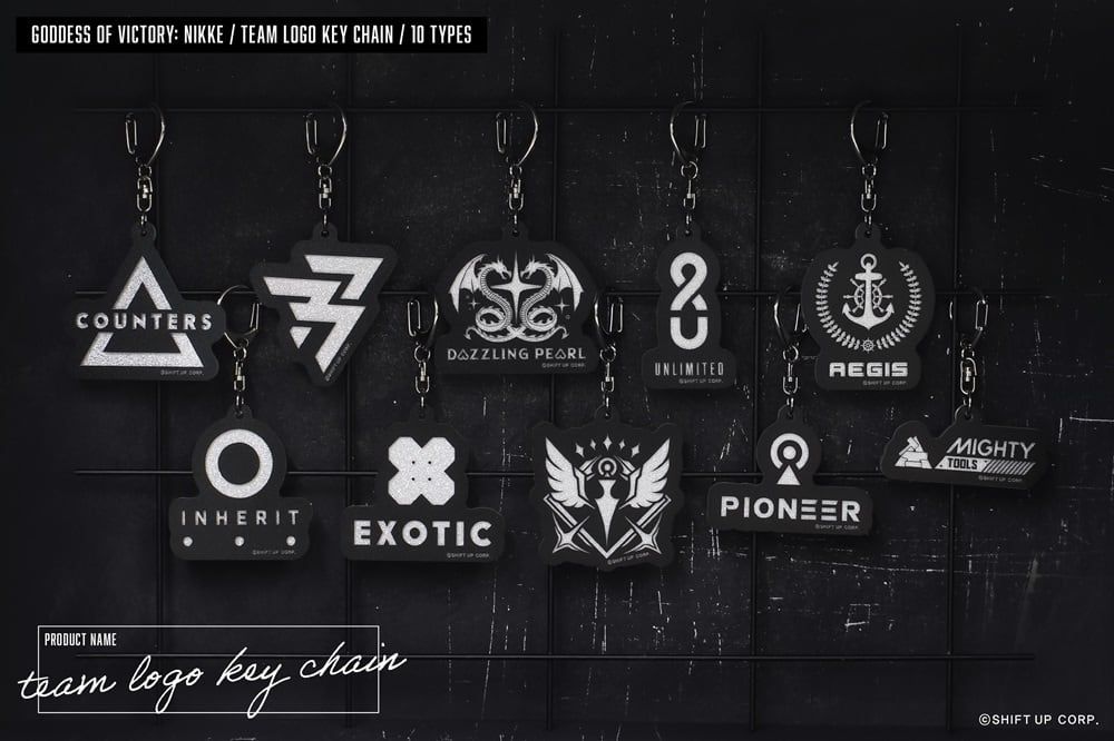 NIKKE-themed keychains made by Algernon Product featuring the various squads in the game. 