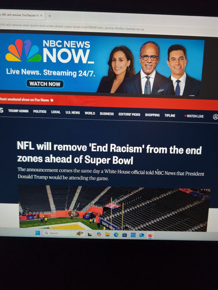 NBC News headline/lede on a desktop monitor reading "NFL will remove "End Racism" from end zones ahead of Super Bowl: The announcement comes the same day a White House Official told NBC News that President Donald Trump would be attending the game."