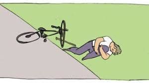 Fallen cyclist with stick through wheel