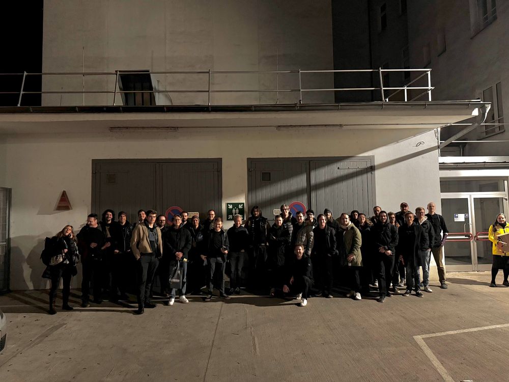 Group of people at the fire alarm gathering point