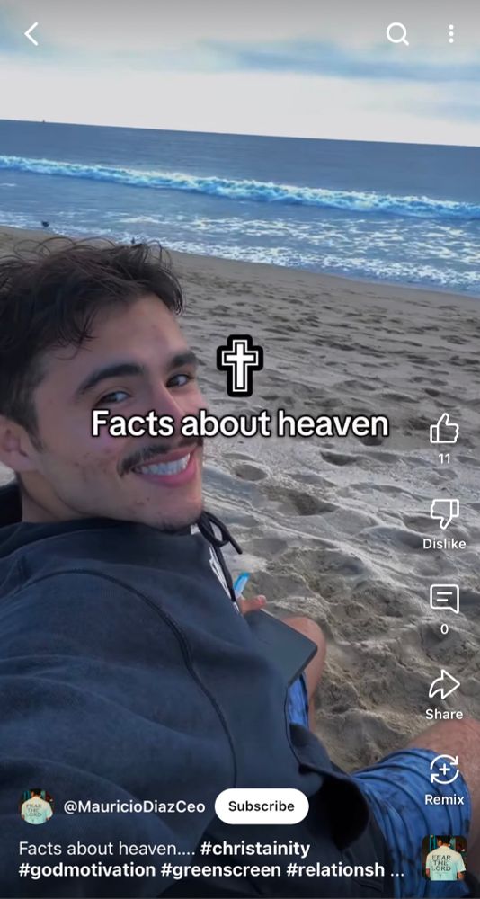 YouTube short of a guy on a beach with the text “Facts about heaven”