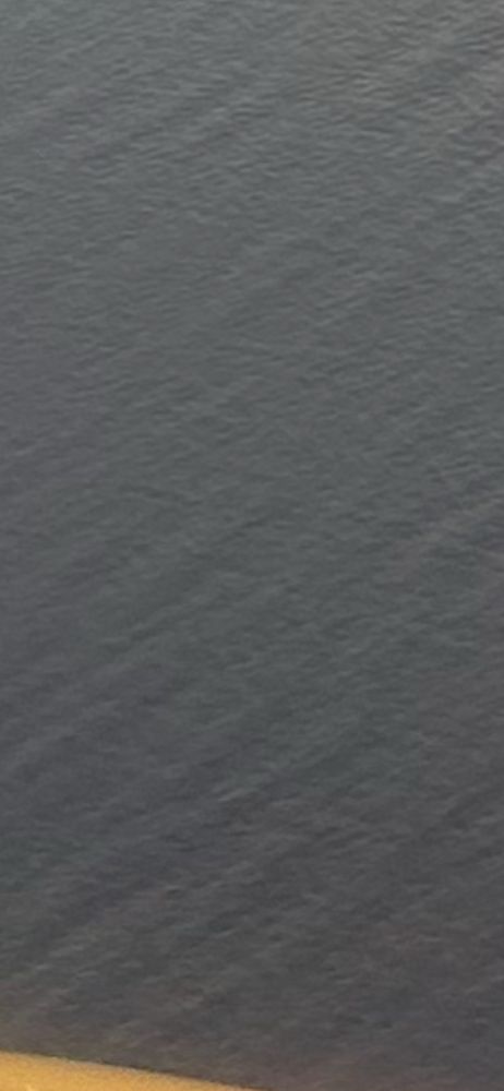 A close up of the ocean in the previous image showing the super position of waves traveling from several different angles and with different length scales from peak to peak. 
