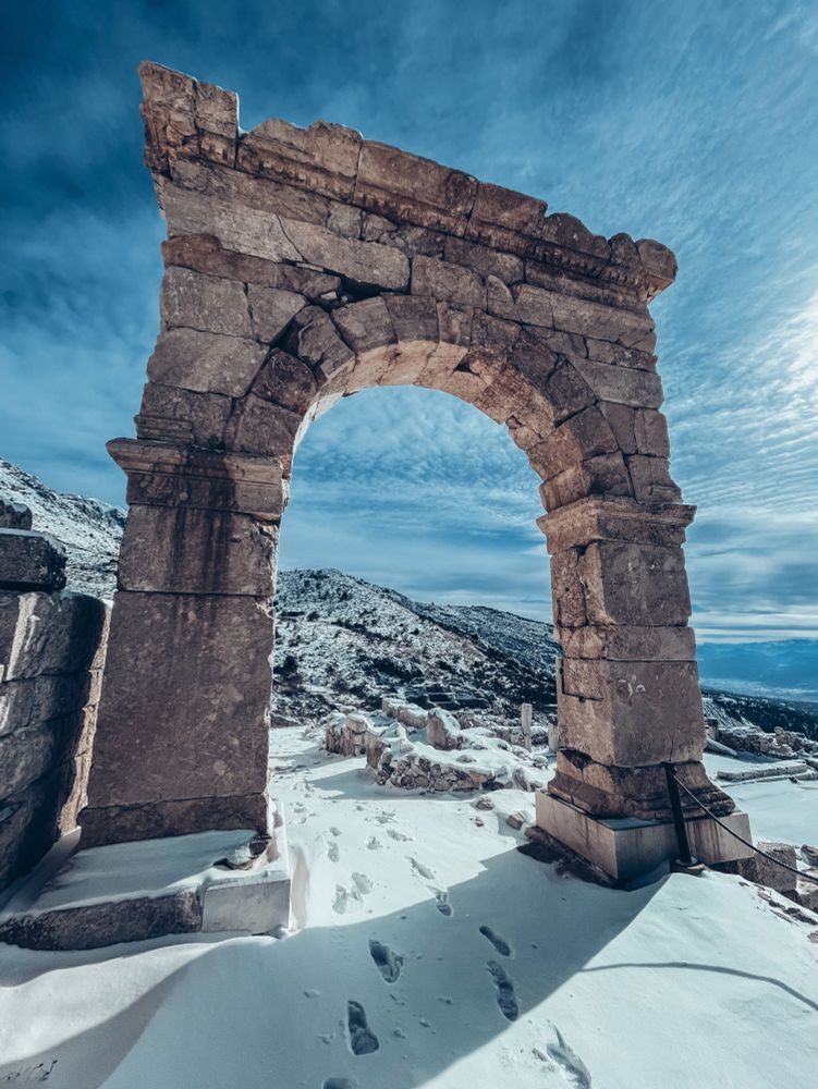 Entrance to the upper agora in the Ancient Greek city of Sagalassos. All alone on a snowy morning! This is what vanlife means to me!