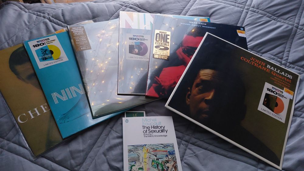 5 new in plastic vinyl records (a Chet Baker, 3 Nina Simone's, a Miles Davis and a John Coltrane) and a book by Michel Foucault - The History of Sexuality Volume 1 
