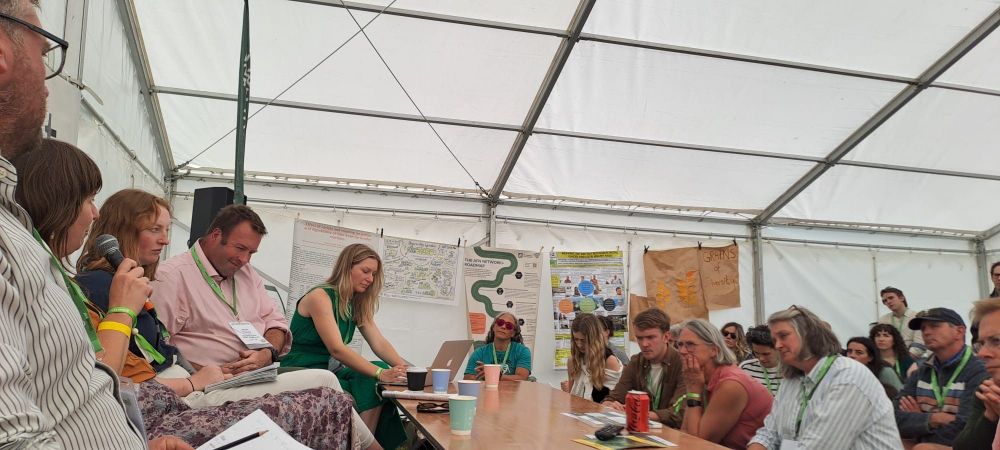 panel session in tent
