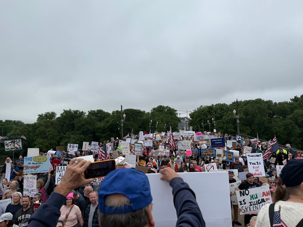  photo of the crowd on a pedestrian bridge between lafayette and west lafayette indiana 