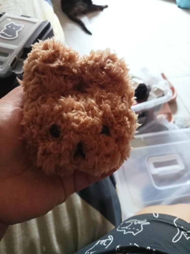 A bunny in brown fluffy yarn