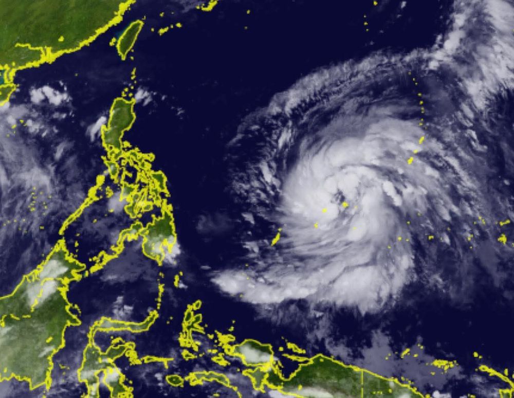 Imaging of an oncoming storm onto the Philippines..the storm, a mass of white clouds, is currently larger than the country itself