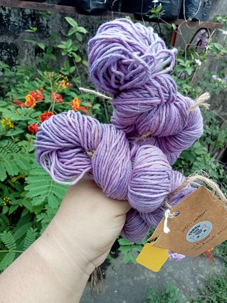 Two hanks of a pretty violet hand dyed yarn