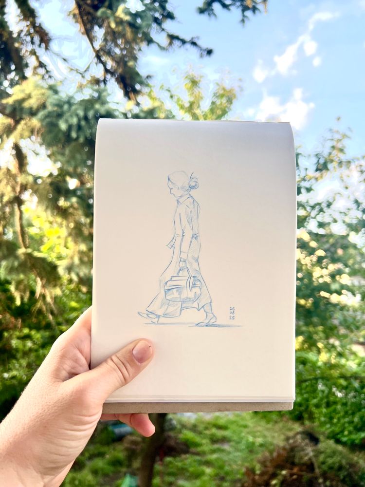 Drawing with blue faber Castell pencil of Woman walking on Bahnhofstrasse Zürich in long dress holding a big handbag in her left hand.