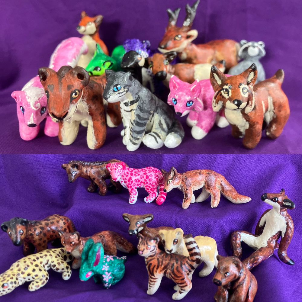 A collection of mini sculptures made with polymer clay and painted with acrylic paint