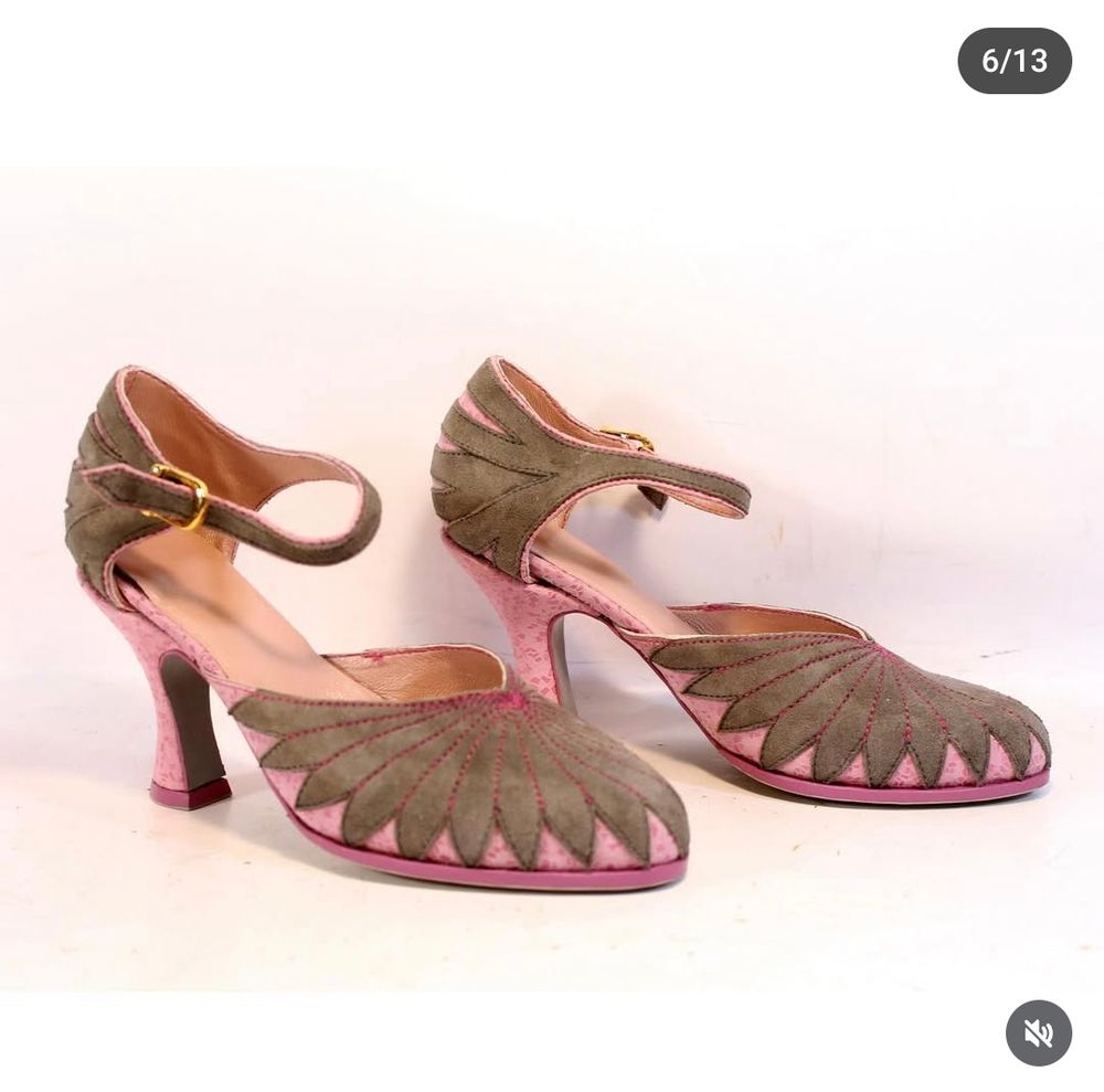 Pink heels with grey suede accents that Glinda wears in the new Wicked movie.