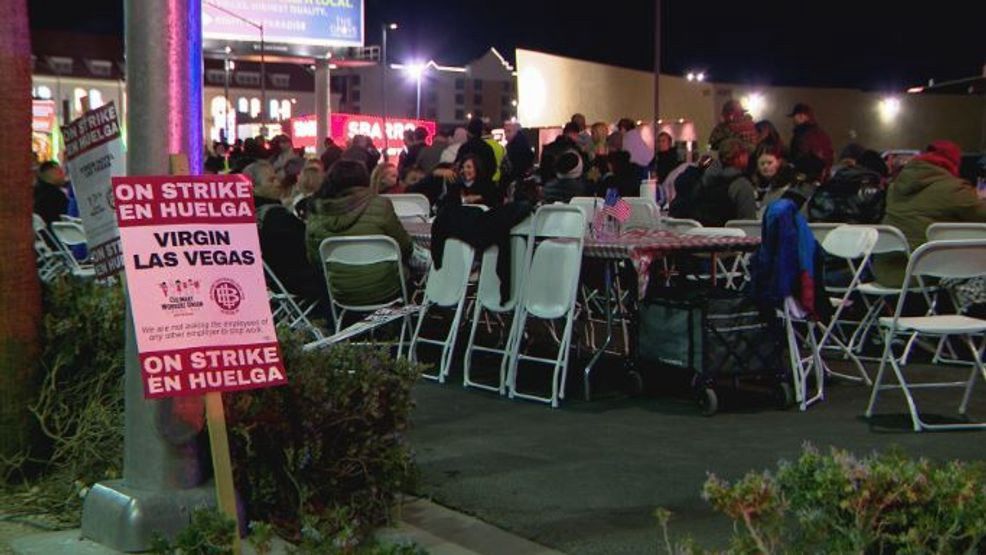 Image of union strikers at Virgin Hotel Las Vegas sitting outside at foldout tables and chairs