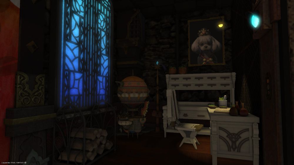 A white apothecary’s workbench and cosmic chair sit opposite a moonlit stained glass window in Kovu’s apartment in FFXIV.