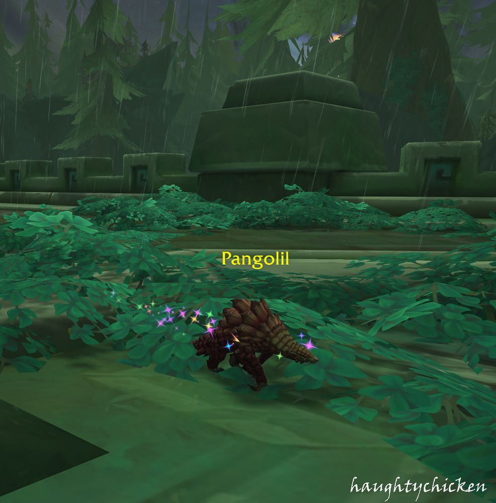 A rust coloured Pangolil pet with a trail of coloured sparkles.