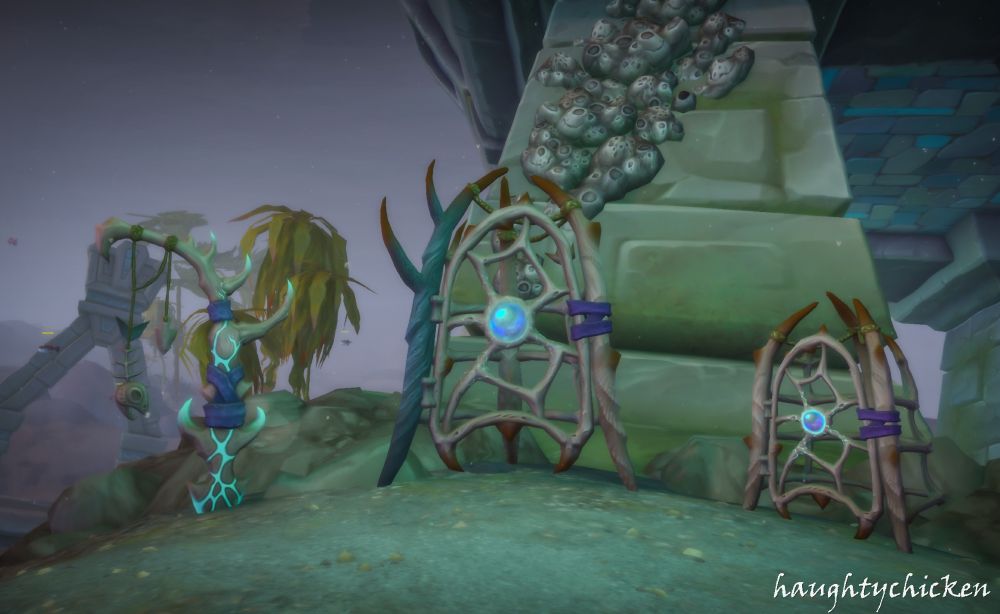 Cages and a banner-like pole with hanging fish skeletons. The items appear to be the same style as Kobyss structures with a central pearl  and possibly made of coral pieces. 